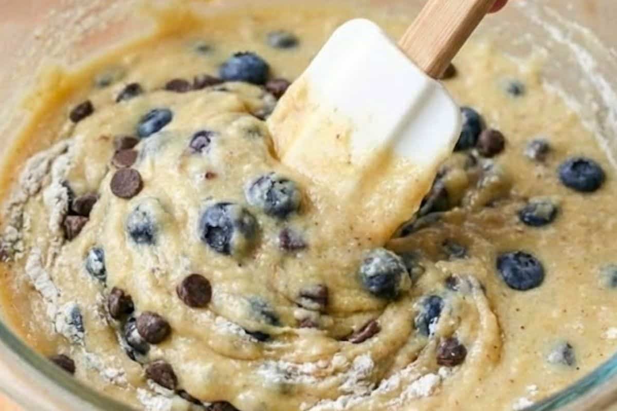 Gently fold in the blueberries and chocolate chips, distributing them evenly through the batter.