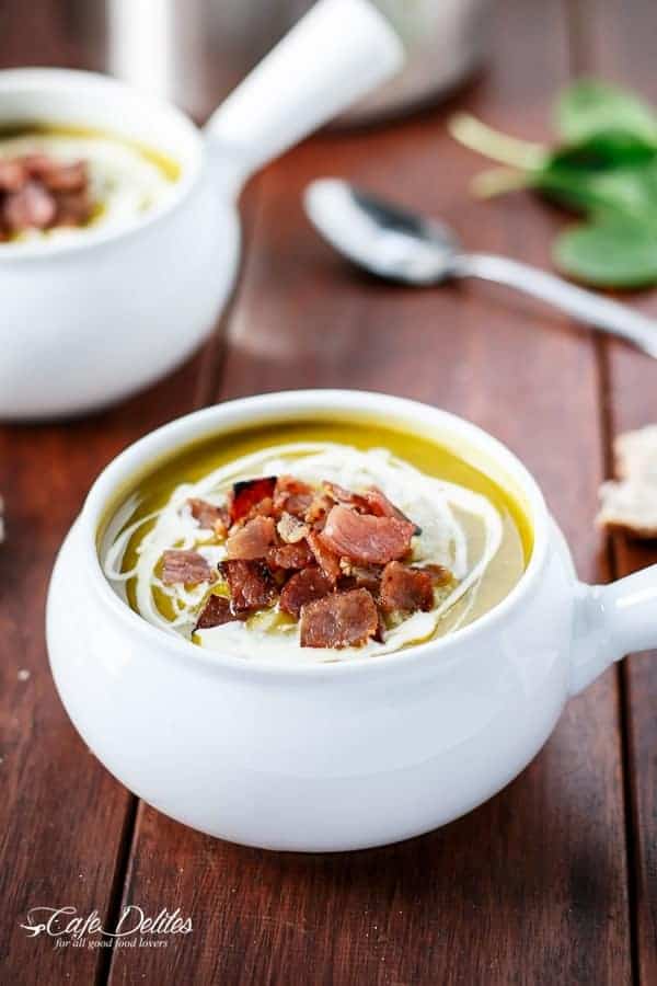 Creamy Pumpkin and Spinach Soup with Crispy Bacon in a pot