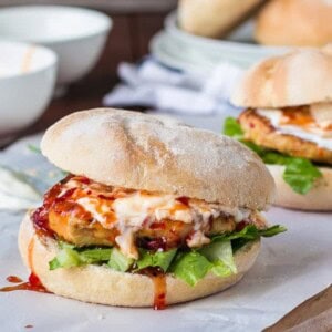 Sour Cream and Sweet Chilli Chicken Burgers on butter paper