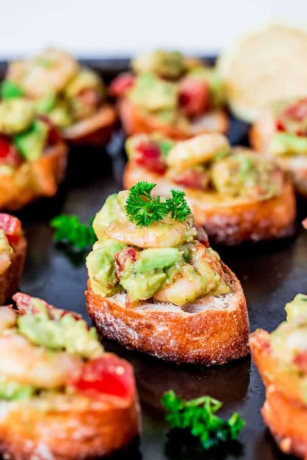 Garlic Prawn and Avocado Crostini on a tray