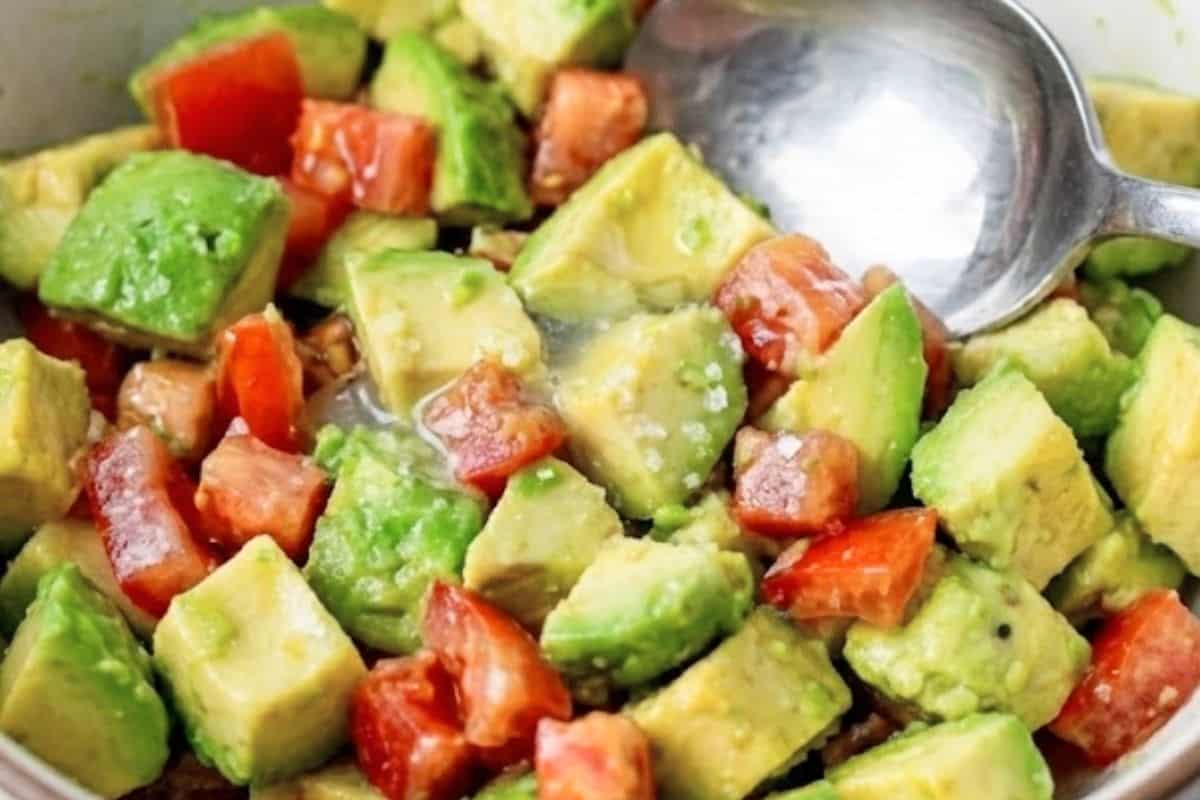 Combine the avocado, tomato, lemon juice, and salt in a bowl