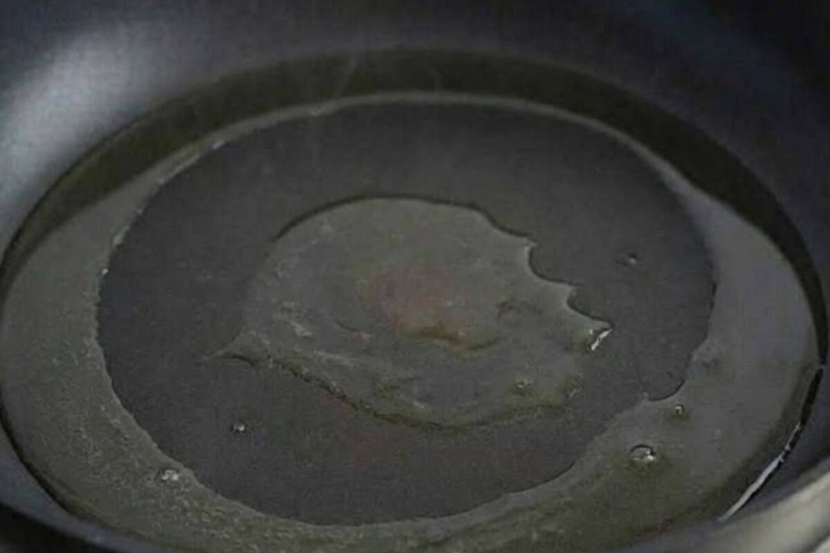 Warm the oil in a large skillet over medium high heat 