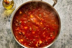 simmering ravioli until soft and cooked through.
