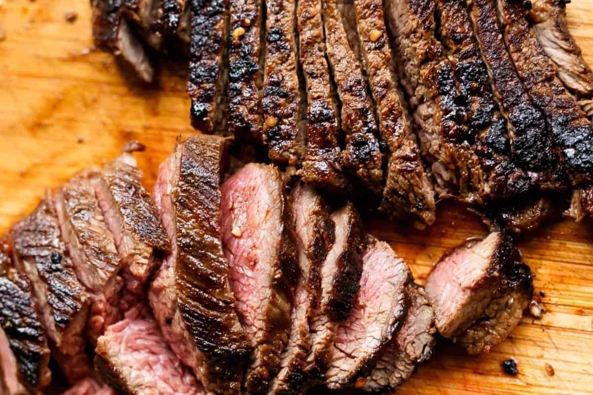 Add oil to the same pan and cook the steak in batches over high heat until it reaches your preferred doneness. Rest the steak on a cutting board and slice thinly.