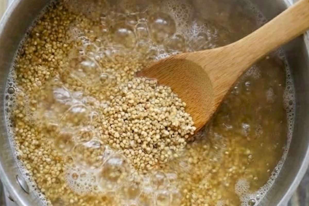 Combine quinoa, stock and salt in a saucepan and boil