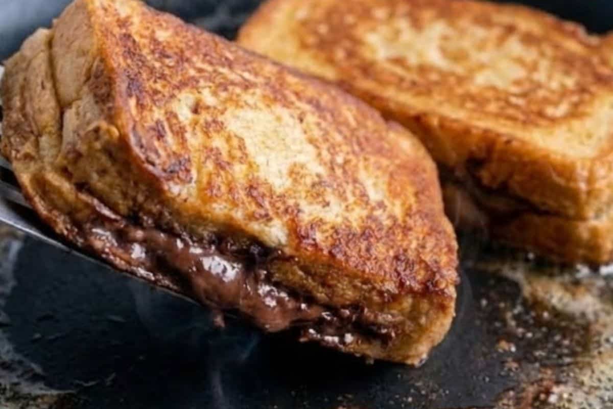 Fry the slices in batches until golden on both, ensuring centers are warm and the chocolate has melted