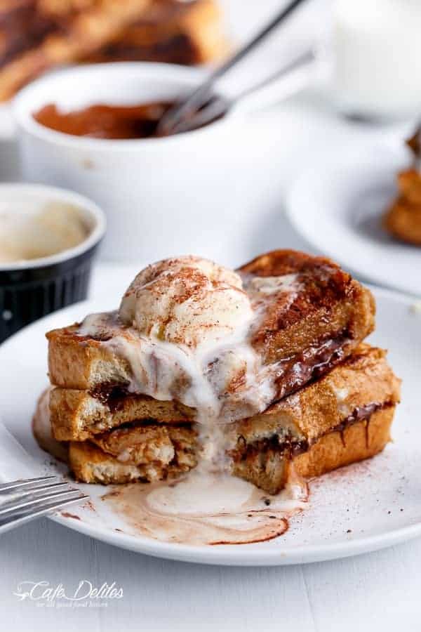 A bite taken from Cappuccino Chocolate French Toast with Coffee Cream