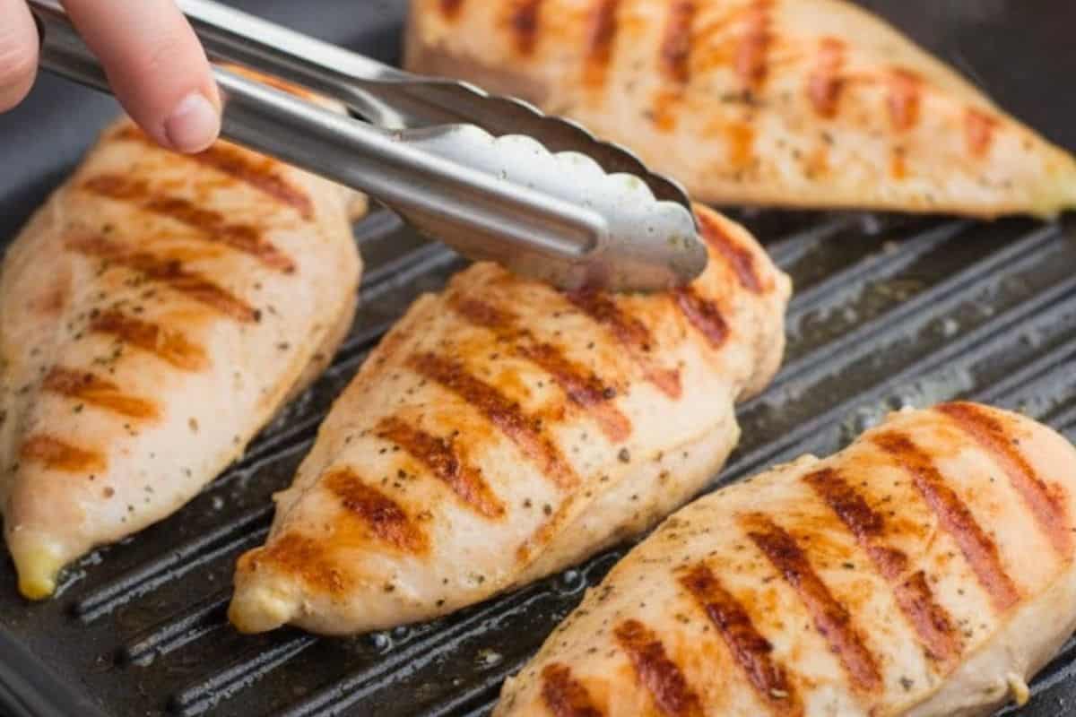 Heat a non-stick grill pan or skillet with a drizzle of olive oil. Cook chicken on both sides until golden