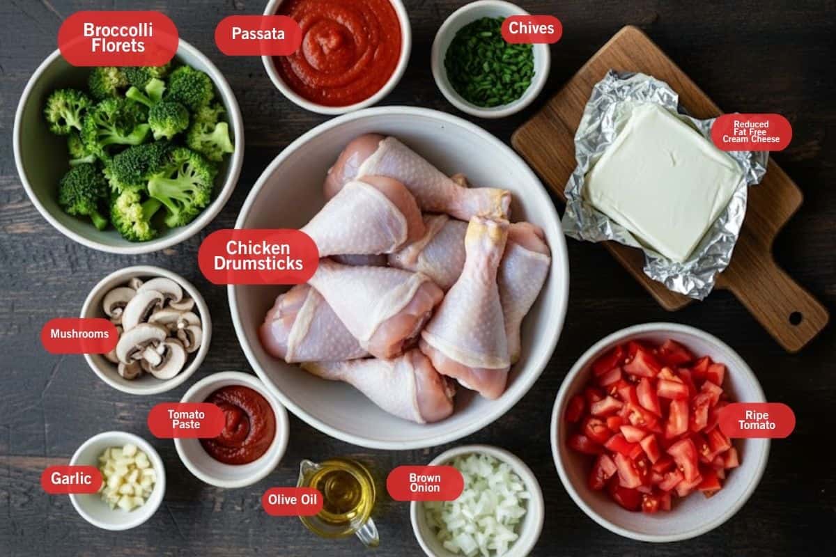 Flat lay photo of Ingredient shot of broccoli florets. pasta, chives, reduced fat free cream cheese, ripe tomatoes, brown onion, olive oil, tomato paste, garlic, mushrooms, chicken drumstricks