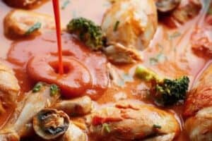 Pour in the condensed tomato soup or passata and simmer for 10-15 minutes until chicken is cooked