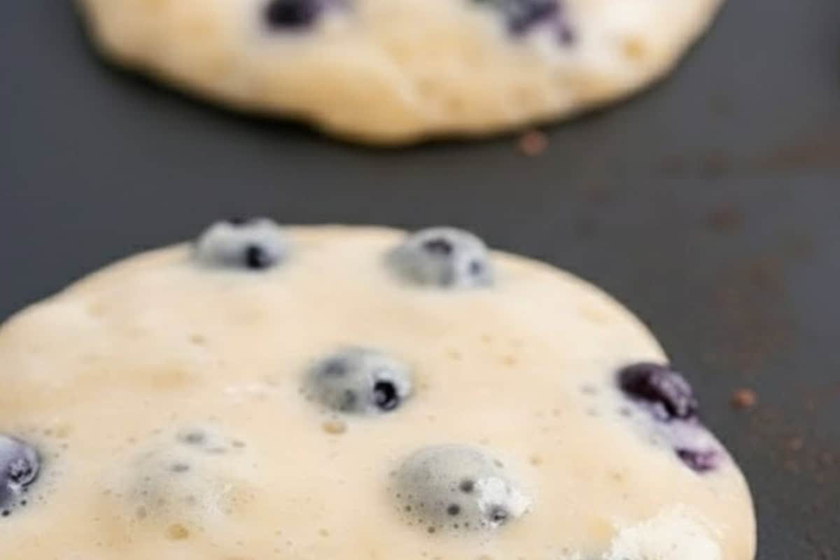 Pour about 1/4 cup of batter onto the pan for each pancake. Cook until bubbles form on the surface and the underside is golden and set.