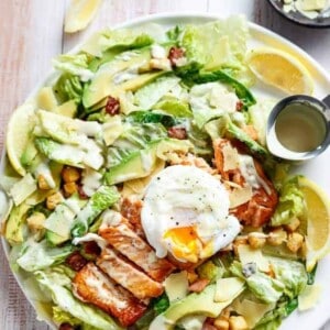 Salmon and Avocado Caesar Salad on a platter