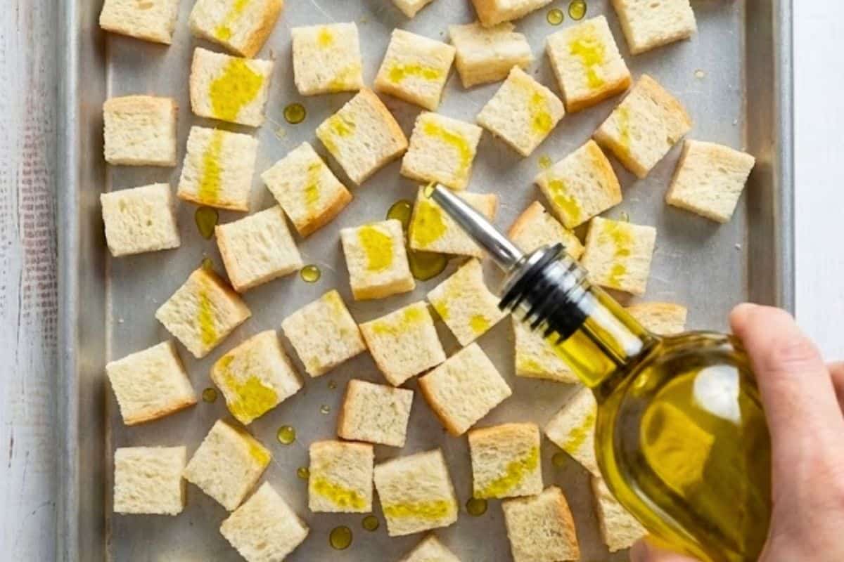 oast the cubed bread with a light drizzle of olive oil until golden and crisp.