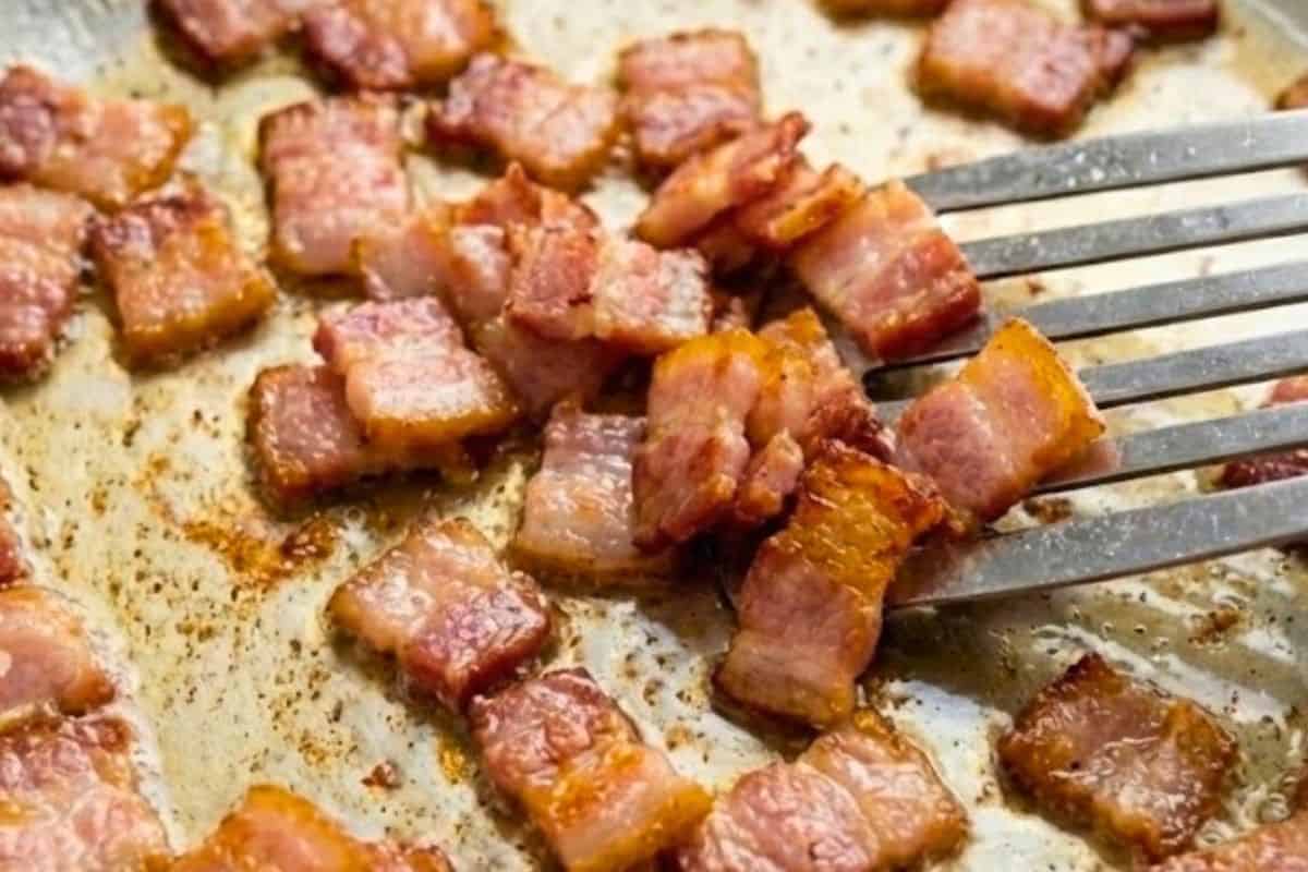 Add the diced bacon to the same skillet over medium heat. Cook until golden and crispy