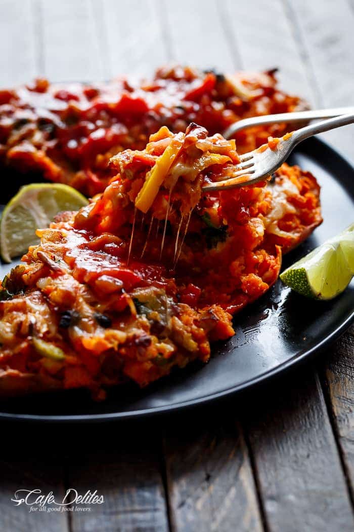 A piece taken from Twice Baked Chicken Fajita Sweet Potatoes