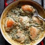 Creamy Spinach Artichoke Chicken Thighs in a pan