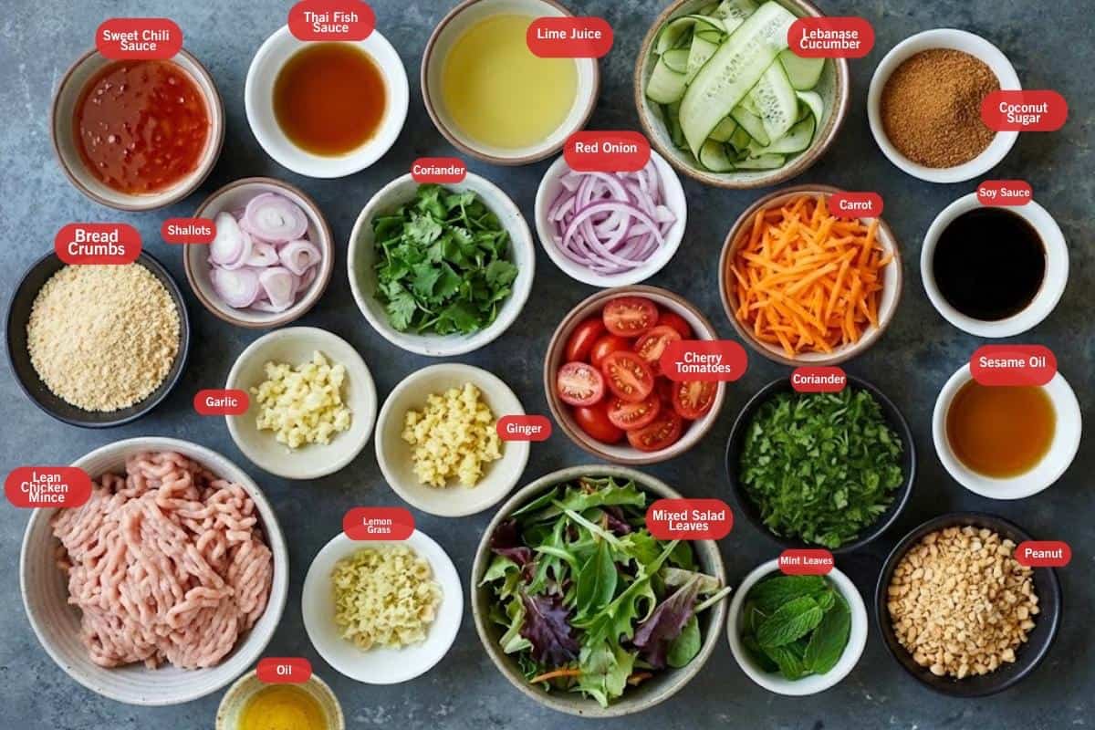 Flat lay photo of ingredient shot for making thai chicken meatball salad
( sweet chili sauce, thai fish sauce, lime juice, Lebanese cucumber, coconut sugar, soy sauce, sesame oil, peanut, coriander, mint leaves, mixed salad leaves, cherry tomatoes, red onion, carrot, lemon grass, oil, lean chicken mince, garlic, ginger, shallots, bread crumbs)