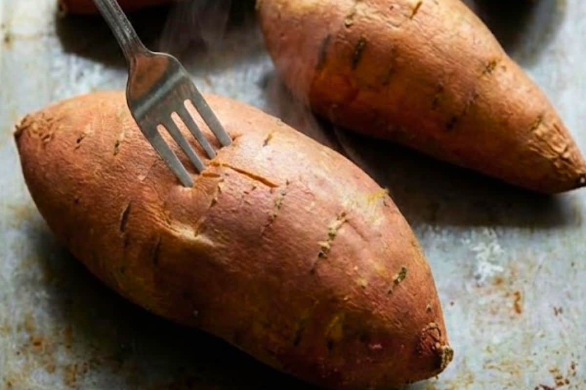 Preheat oven to 220°C (430°F) and lightly spray a baking tray with nonstick spray. Arrange the sweet potatoes on the tray and roast for about 1 hour