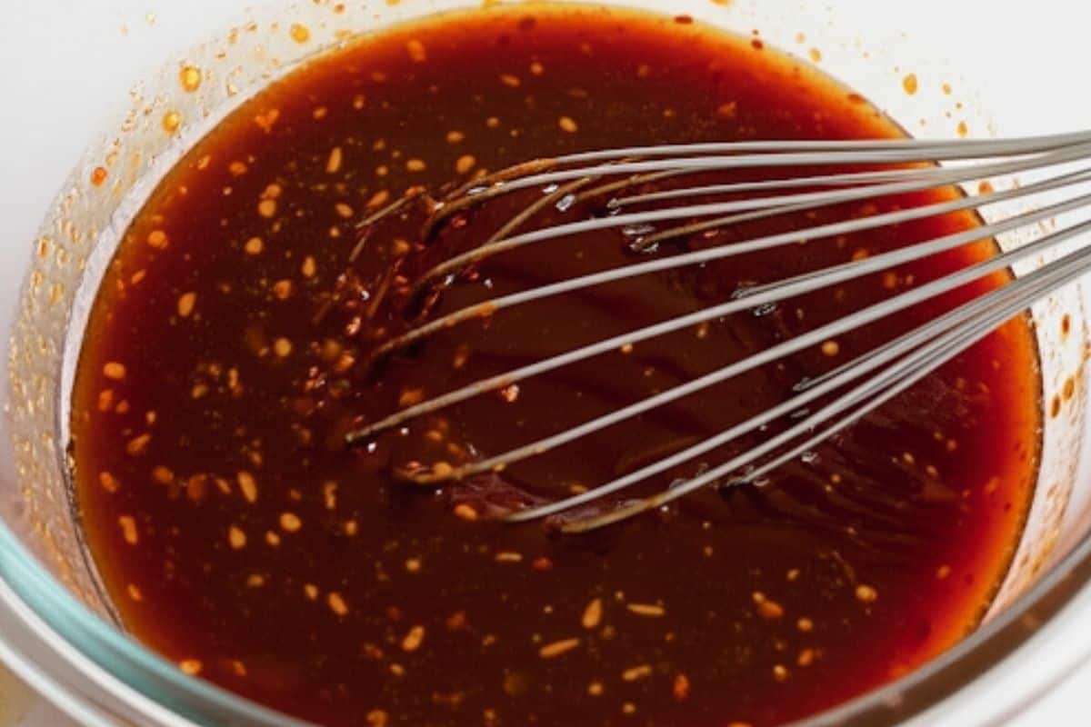 Whisk all the glaze ingredients in a bowl and pour half into a small sauce pan and reserve for later.