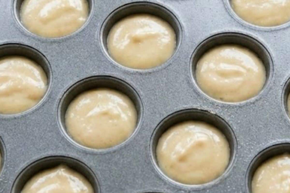 Spoon about 2 teaspoons of batter into each cavity, filling them roughly three-quarters