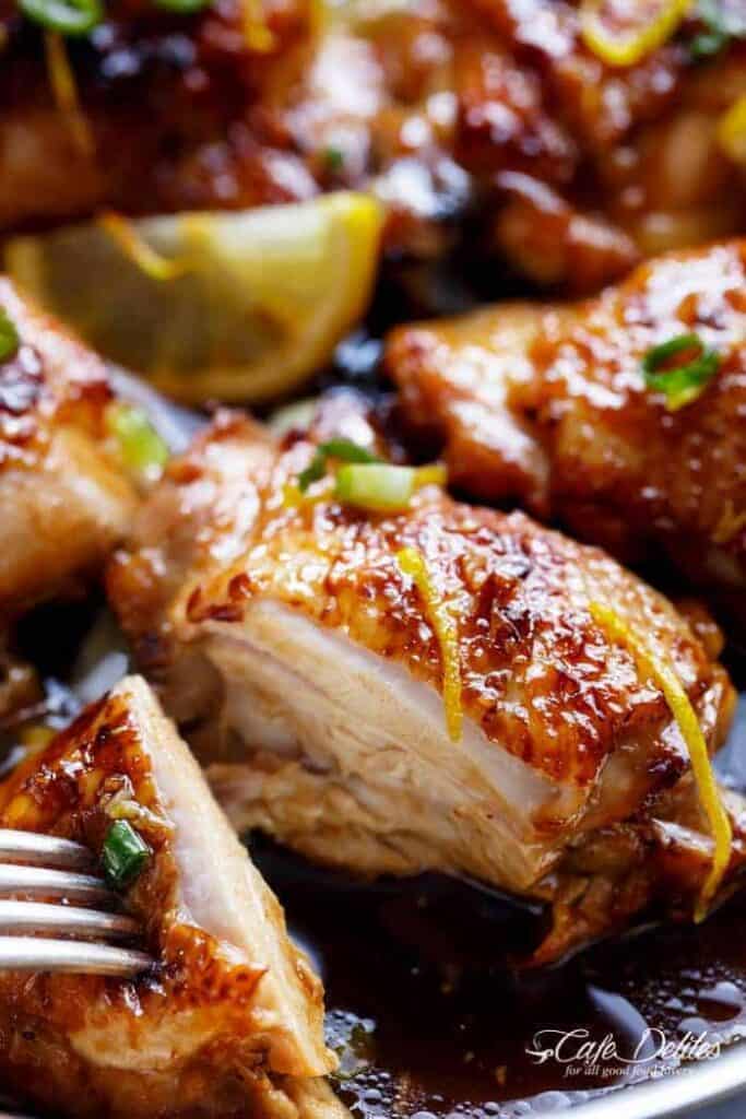 Image focusing on a chicken piece from Honey Lemon Garlic Chicken