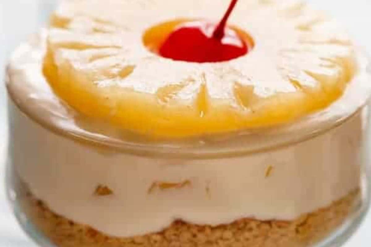 Top each cheesecake with extra pineapple and finish with a maraschino cherry placed in the centre