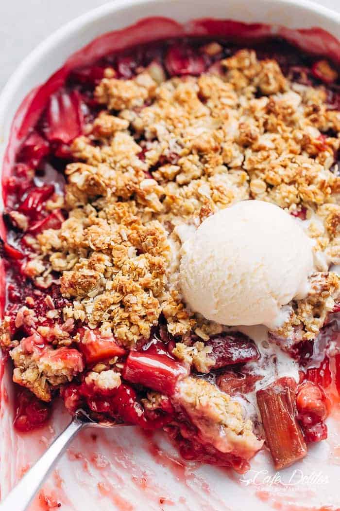 Strawberry Rhubarb Crisp with ice cream scoop
