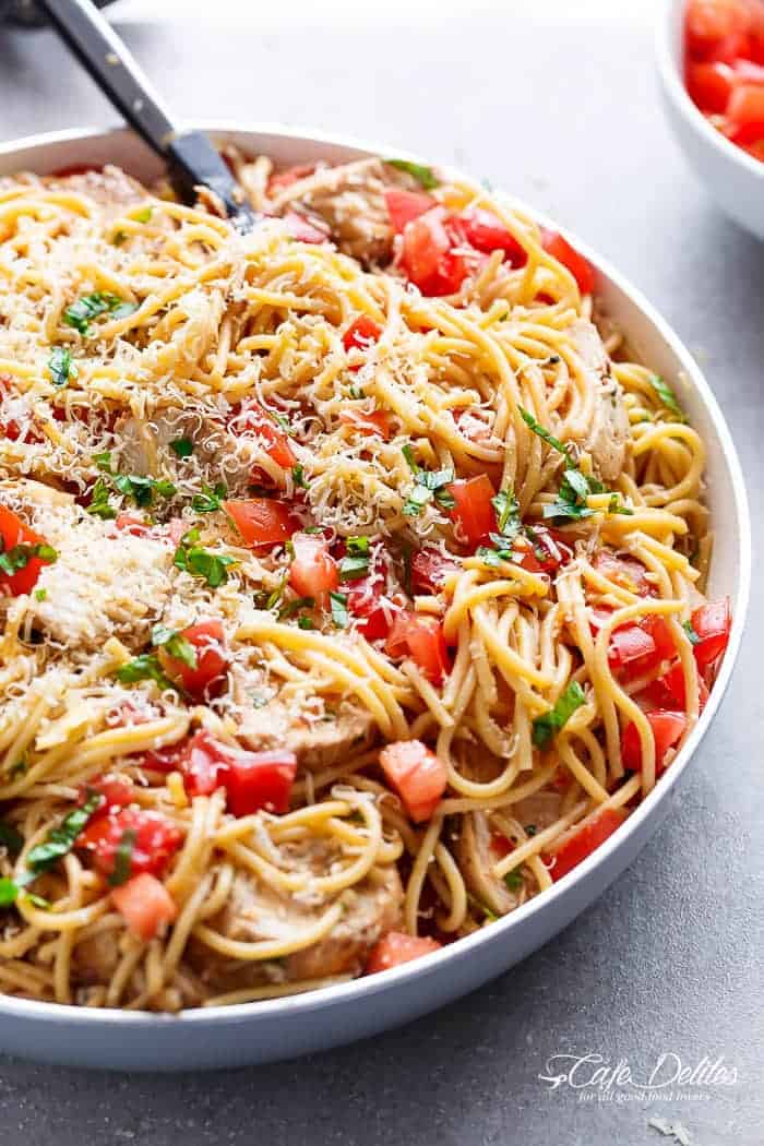 Side view image of Bruschetta Chicken Pasta Salad is Filled with Italian seasoned grilled chicken, garlic and parmesan cheese!