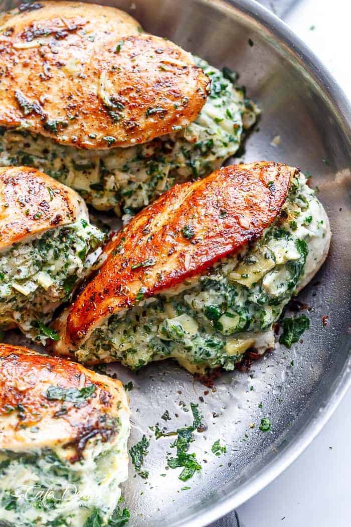 Spinach Artichoke Stuffed Chicken is a delicious way to turn a creamy dip into an incredible dinner! Serve it with a creamy sauce for added flavor!