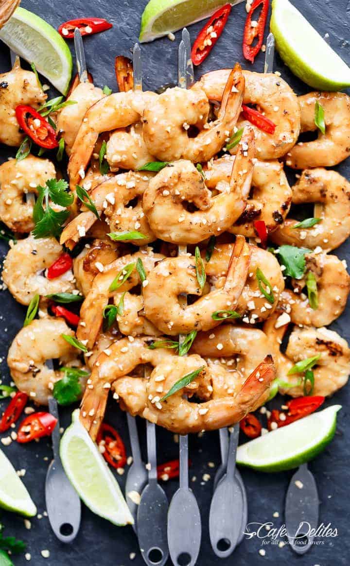 Satay Shrimp Skewers kept on black tray