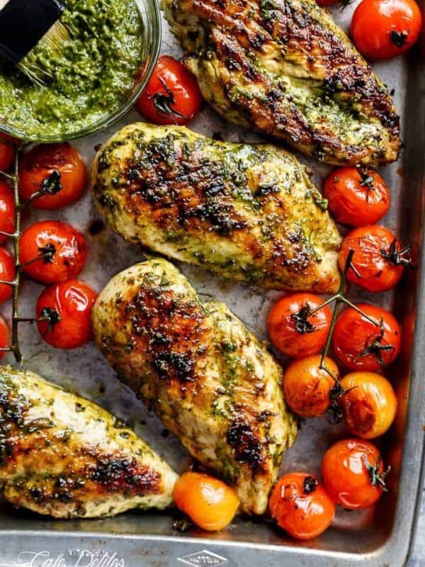 Pesto Chicken GRILLED OR OVEN BAKED, smothered in a creamy, homemade Basil Pesto! Only 2 main ingredients needed, this chicken is out of this world!