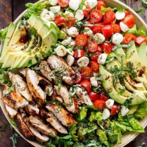 Top view of Chicken Avocado Caprese Salad on a plater