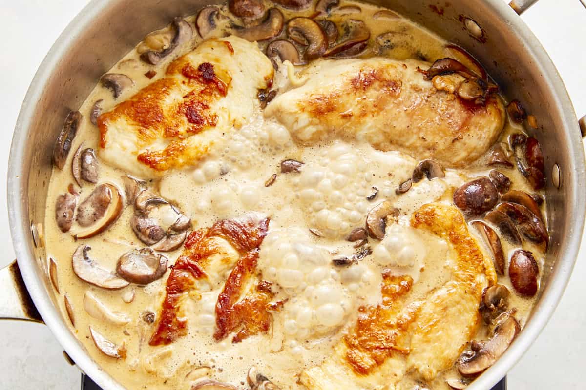 Chicken and mushrooms simmering in the creamy champagne sauce.