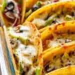 Oven Baked BBQ Chicken Pizza Tacos on a baking tray