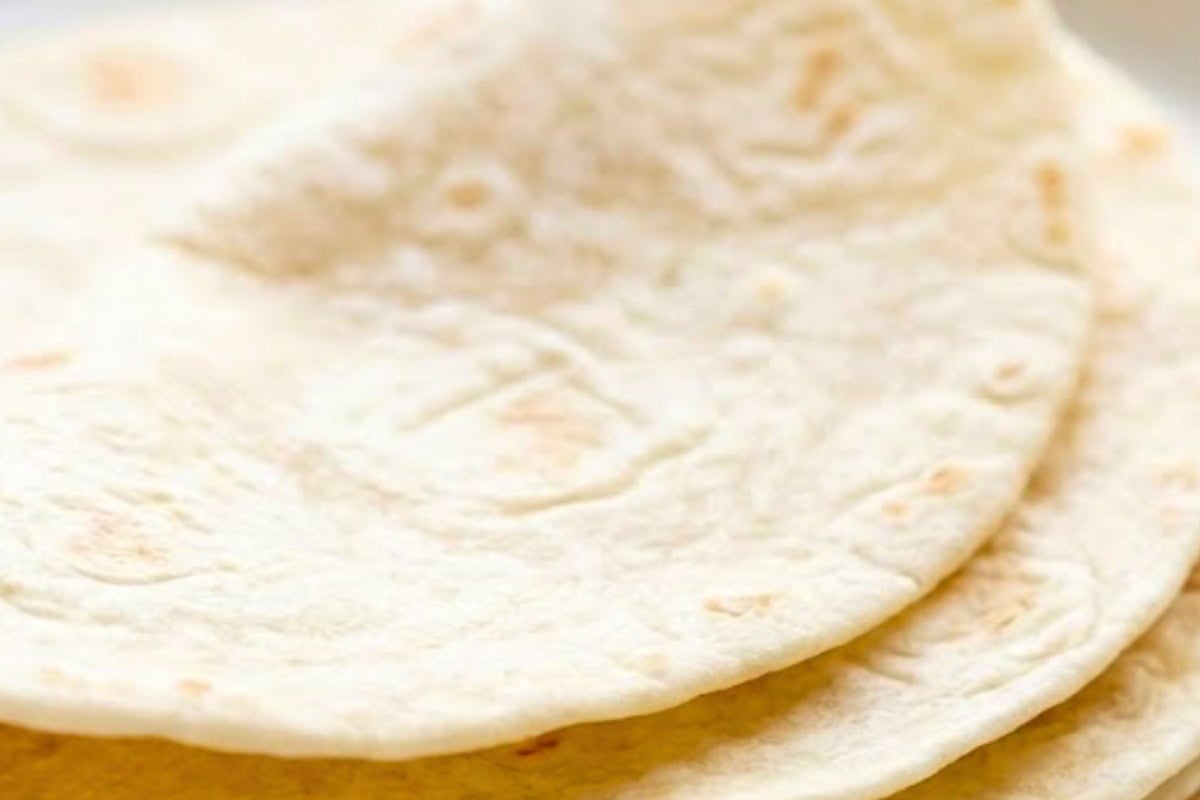 Heat the tortillas in the microwave