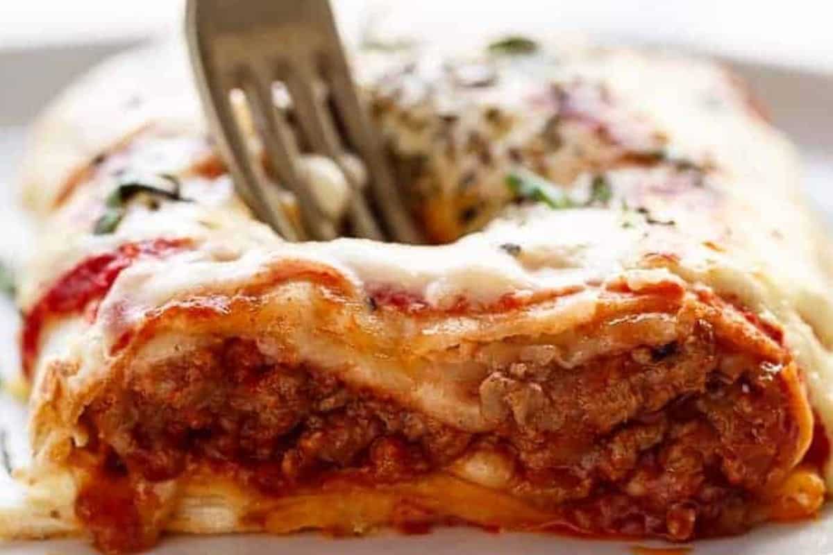 Place the burritos on the tray, spoon over remaining sauces, scatter with shredded mozzarella, then grill until golden