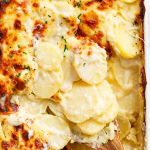 Cheesy Garlic Parmesan Scalloped Potatoes  in a baking tray