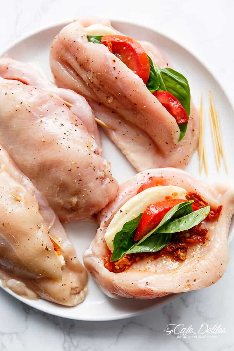 4 Raw chicken pieces stuffed with other ingredients