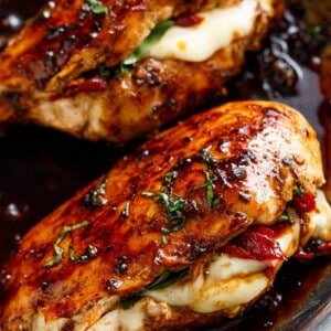 Caprese Stuffed Balsamic Chicken is a twist on Caprese, filled with both fresh AND Sun Dried Tomatoes for a flavor packed chicken!