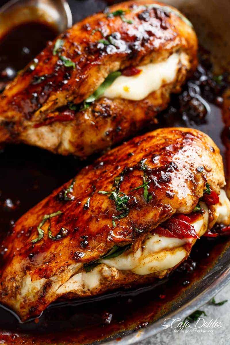 Caprese Stuffed Balsamic Chicken is a twist on Caprese, filled with both fresh AND Sun Dried Tomatoes for a flavor packed chicken! 