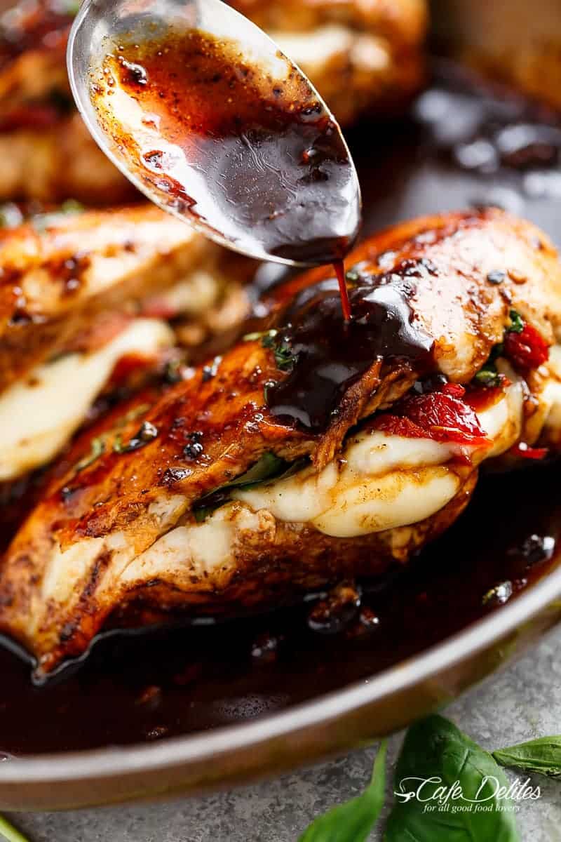 Black Sauce poured on Caprese Stuffed Balsamic Chicken