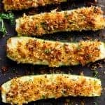 Parmesan Crusted Zucchini are easy to make and are one of THE best ways to enjoy zucchini! Crispy and crunchy, the perfect side dish OR snack! |