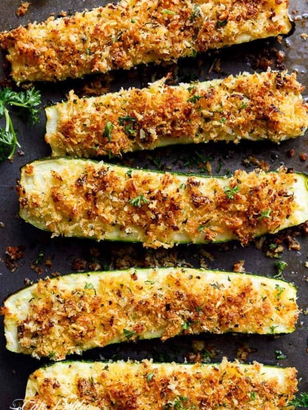 Parmesan Crusted Zucchini are easy to make and are one of THE best ways to enjoy zucchini! Crispy and crunchy, the perfect side dish OR snack! |