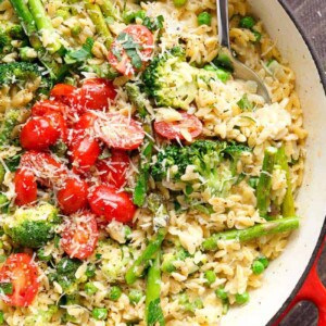 One Pot Orzo Primavera is full of green vegetables and a beautiful sauce with a hint of cream, garlic and lemon!