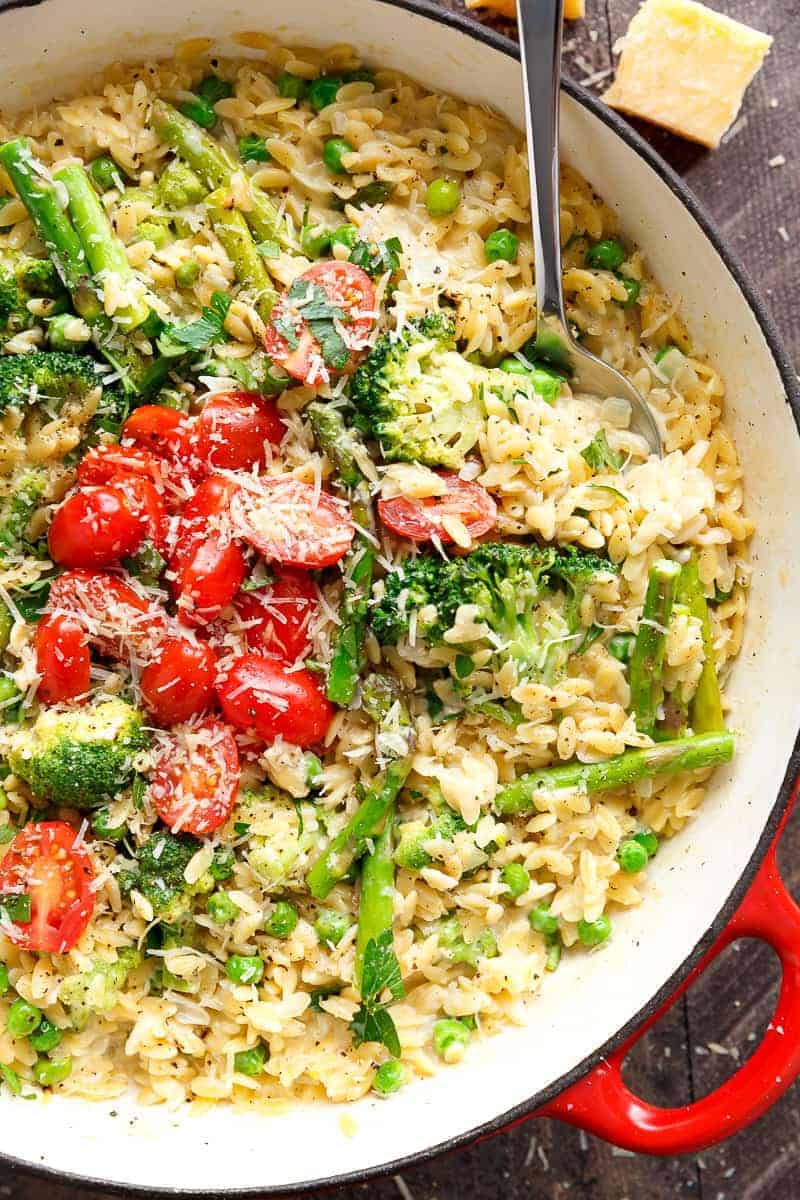 One Pot Orzo Primavera is full of green vegetables and a beautiful sauce with a hint of cream, garlic and lemon!