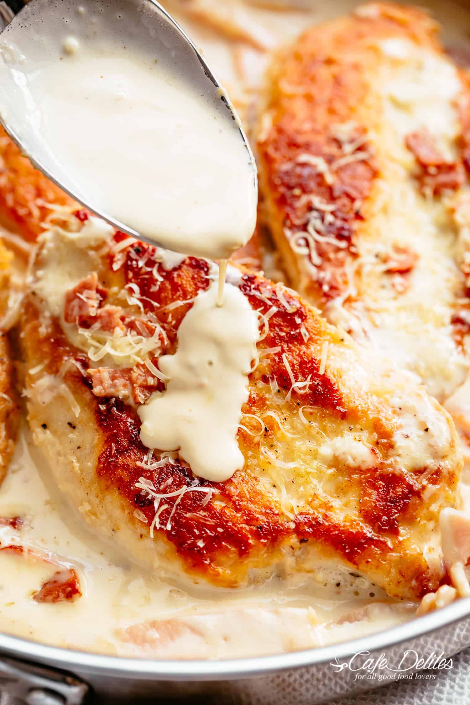 Dripping Creamy sauce on Carbonara Chicken pieces