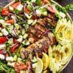 Loaded Greek Chicken Avocado Salad on a huge plater