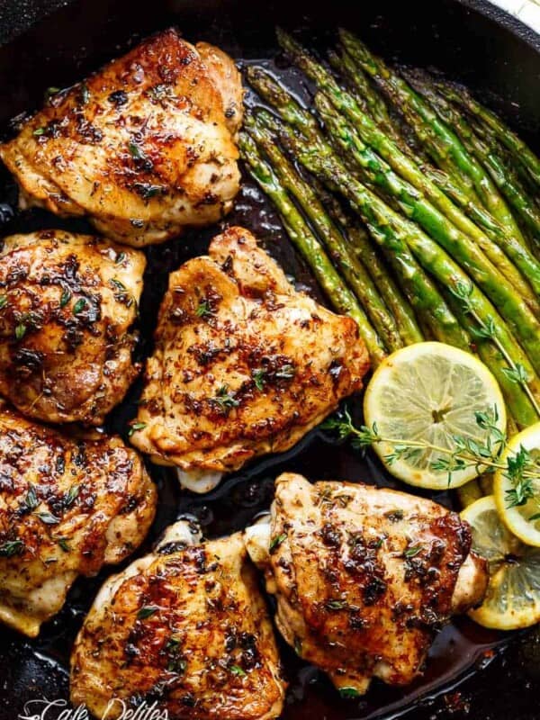 Top view of Lemon Garlic Butter Chicken Thighs with Asparagus