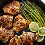 Top view of Lemon Garlic Butter Chicken Thighs with Asparagus