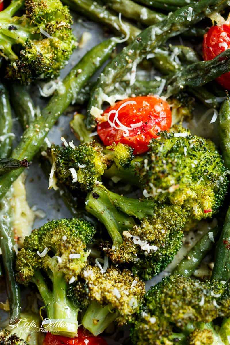Focusing on broccoli and tomato piece from Sheet Pan Garlic Parmesan Roasted Broccoli & Green Beans